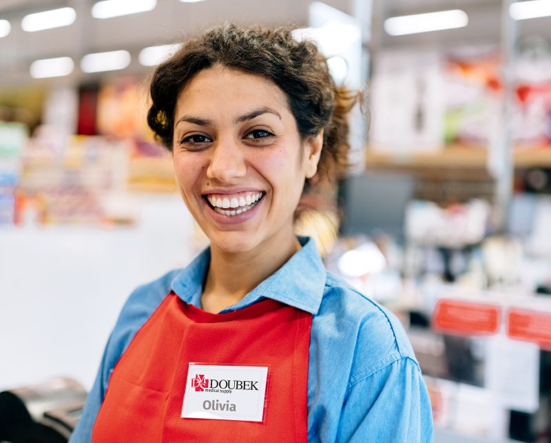 Friendly Smiling Female Doubek Team Member