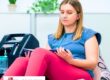 Woman on home oxygen therapy sitting in a chair reading a book